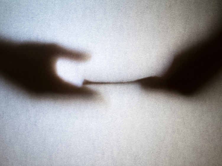 Silhouette of business man hands giving bribe