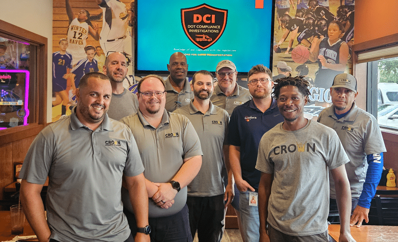 Service Technicians for Crown Information Management are smiling in a group photo